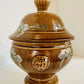 Pottery Urn with Metal Accents